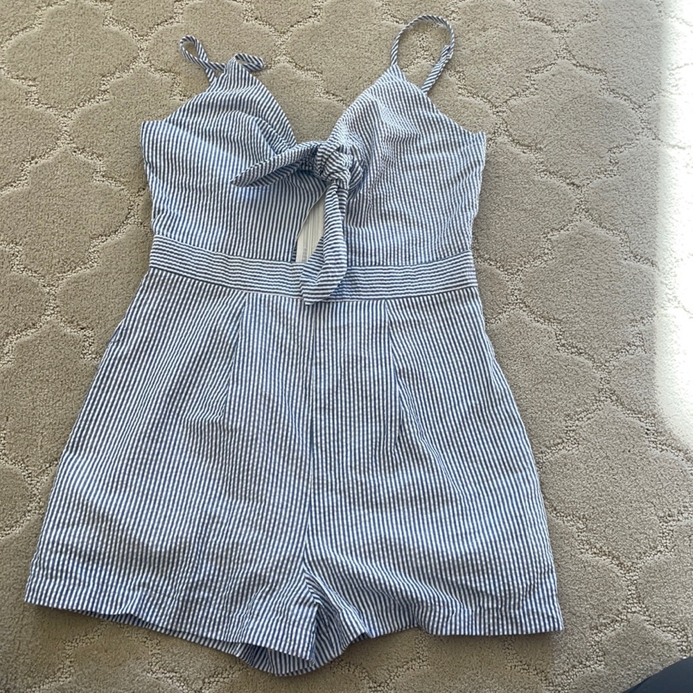 Blue and white stripe seersucker tie front romper! Brand is Everly from TopShop.
